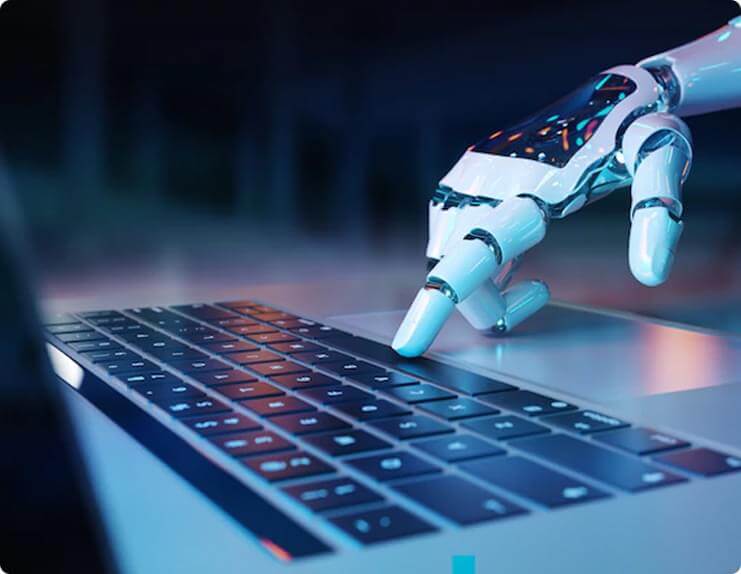 Robotic hand typing on a laptop