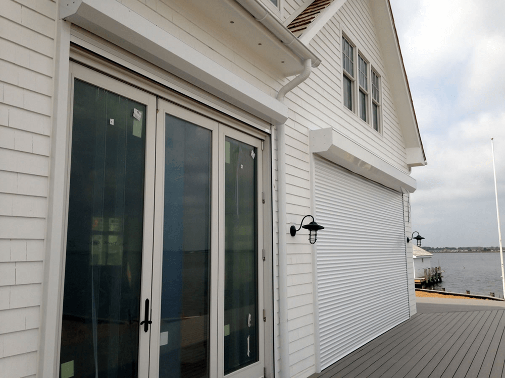 Rolling shutters integrated into a residential building